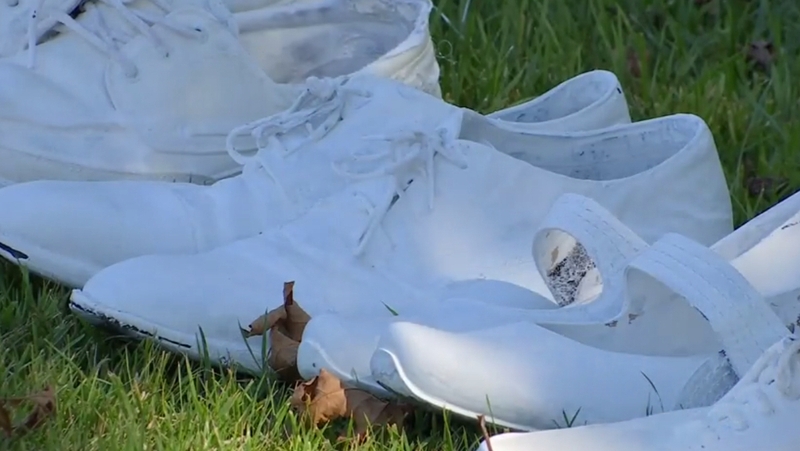 Shoes were donated by members of the public and painted white by a church volunteer.