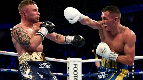 Carl Frampton (L) lost a unanimous decision to Josh Warrington last December
