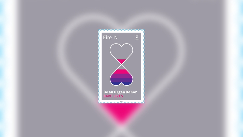 The stamp features an hourglass timer 'to represent the precious nature of time and the gift of life passing from one person to another through organ donation'