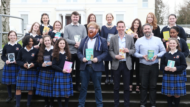 Author Dave Rudden and Ryan Tubridy with pupils and staff from St Raphaela's Secondary School Dublin, launching Children's Books Ireland's library campaign