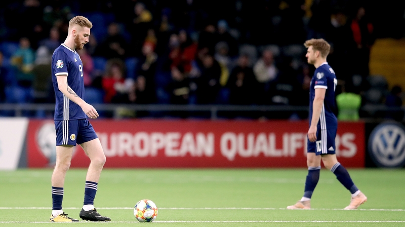 Oliver McBurnie reacts after a difficult night for Scotland