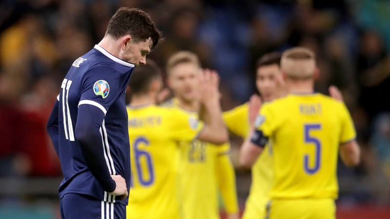 Oliver Burke cuts a forlorn figure after the concession of another goal against Kazakshtan