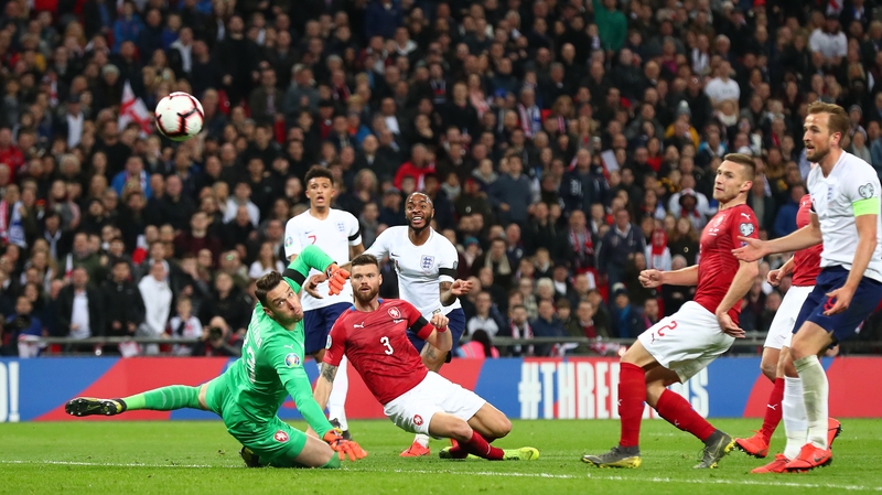 Raheem Sterling scores England's third