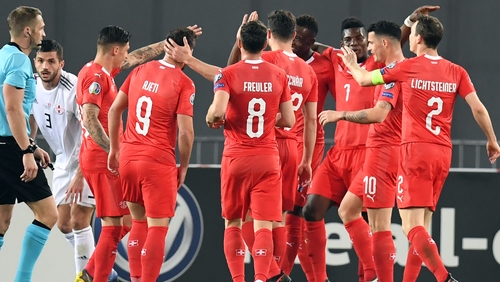 Switzerland's players celebrate their second goal