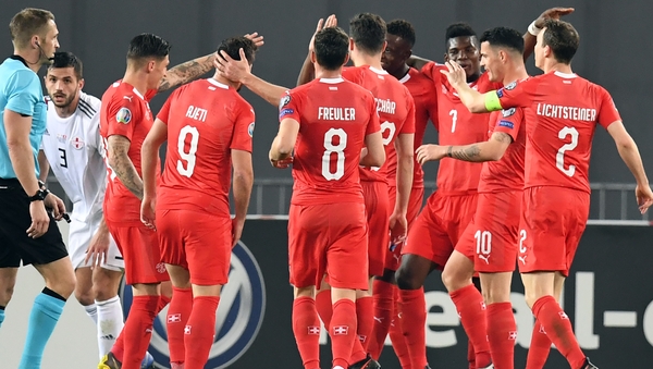 Switzerland's players celebrate their second goal