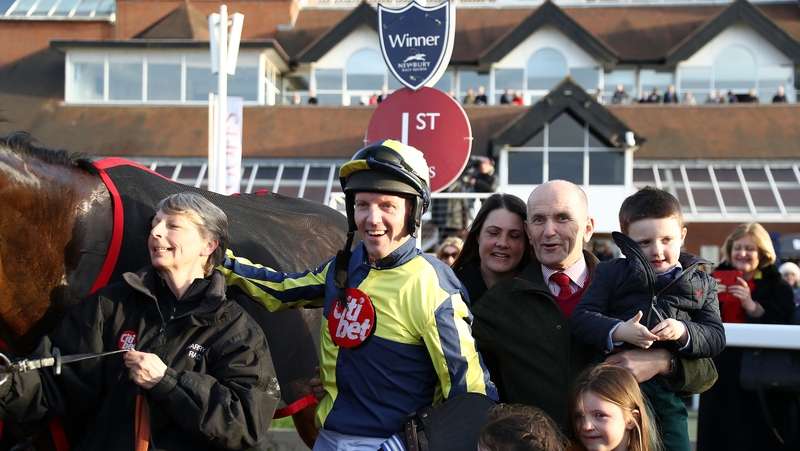 oel Fehily poses with his family after winning his last race before retirement