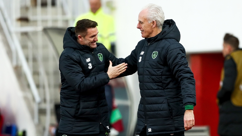 McCarthy and coach Robbie Keane