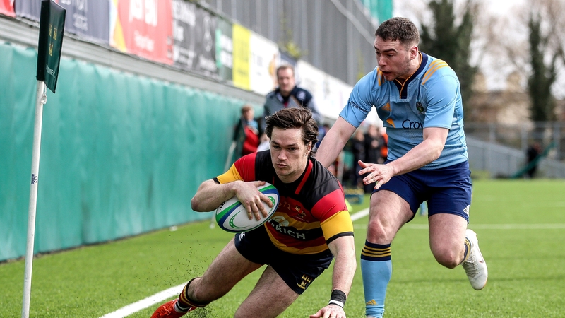 Lansdowne's Dan McEvoy scores a try against UCD
