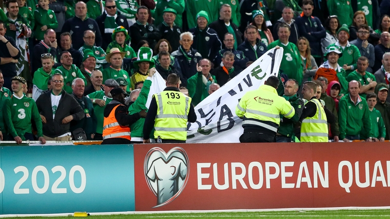 Ireland fans in Gibraltar unfurl an anti-John Delaney banner