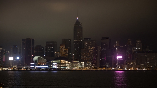 Victoria Harbour in Hong Kong turns out the lights