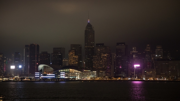 Victoria Harbour in Hong Kong turns out the lights