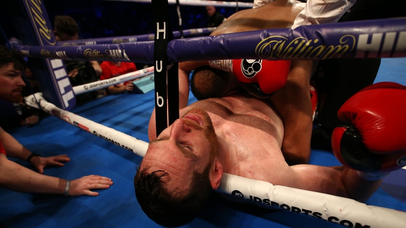 David Price reacts after being bitten by Kash Ali