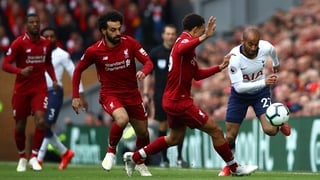Lucas Moura tries to skip past Trent Alexander Arnold