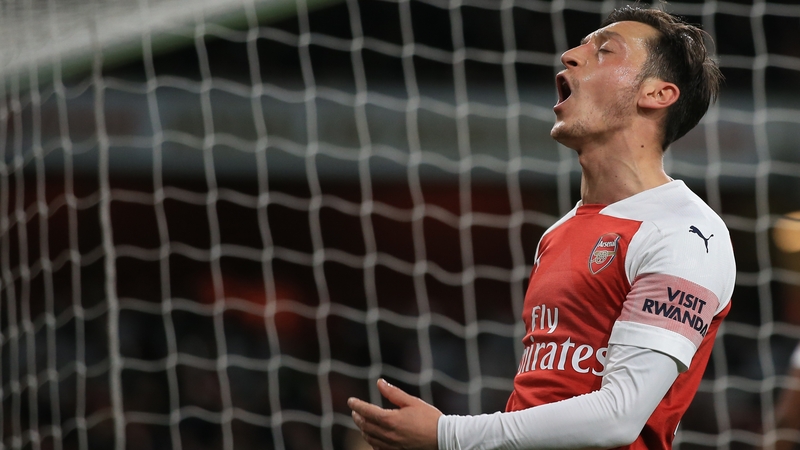 Mesut Ozil claims he's staying with Arsenal