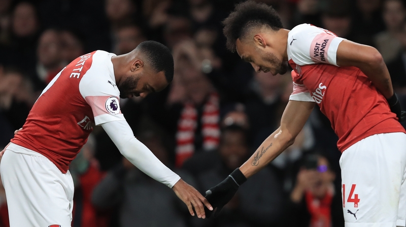 Alexandre Lacazette (L) celebrates his game-clinching goal with Pierre-Emerick Aubameyang