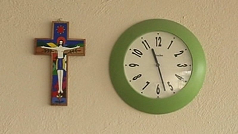 The school reward the boy's classmates with homework passes for participating in a first communion choir ceremony