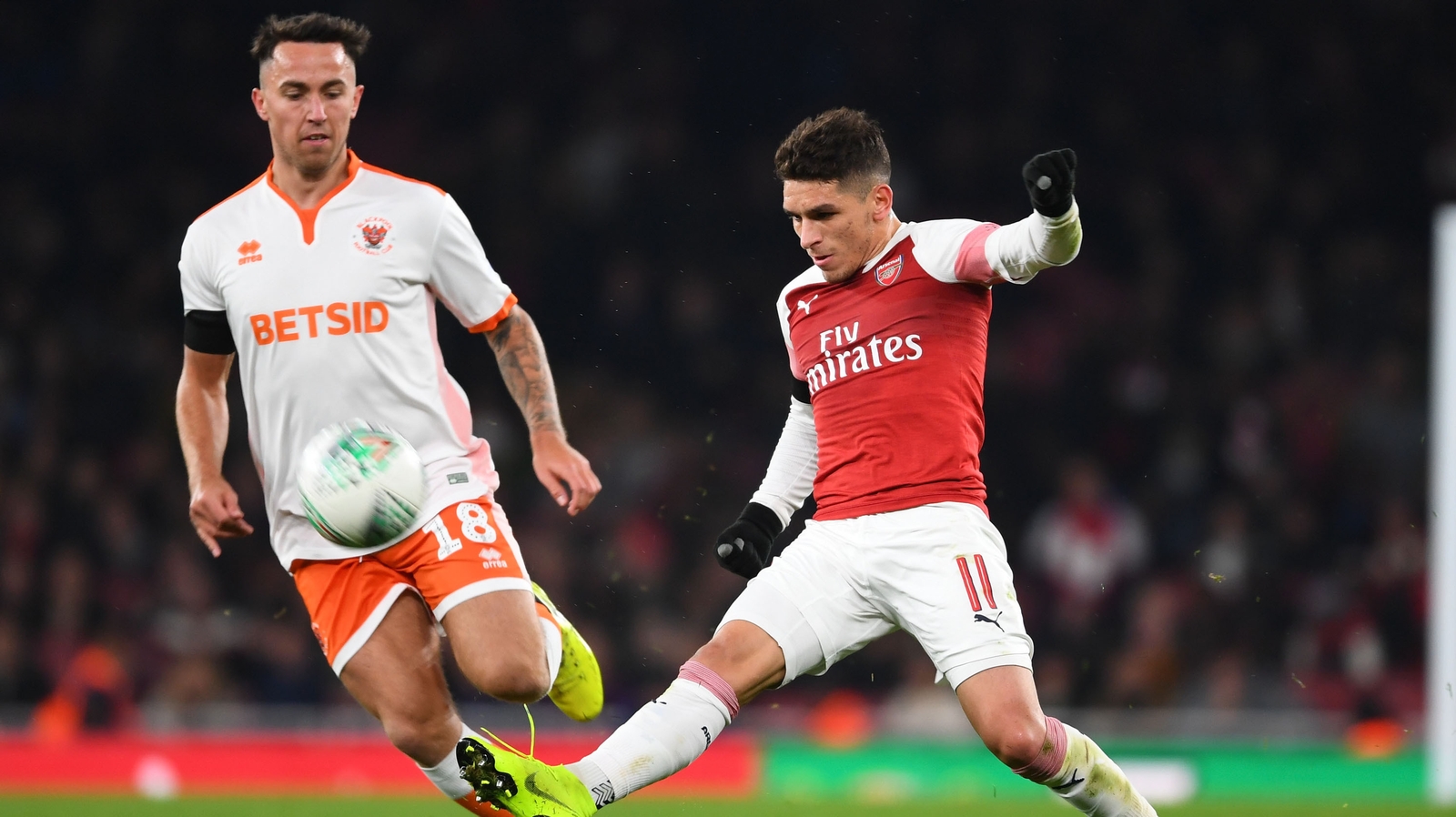 Arsenal's Lucas Torreira fends off John O'Sullivan in the Carabao Cup last year