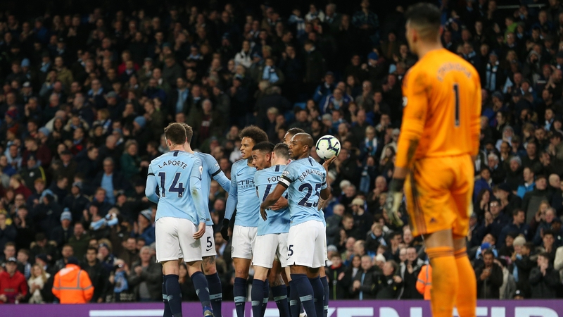 City players congratulate Leroy Sane after his goal against Cardiff