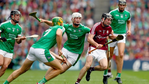 Limerick's Kyle Hayes (C) and Dan Morrissey (2nd L) close down Galway's Padraig Mannion during the All-Ireland final