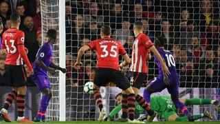 Naby Keita heads home for Liverpool