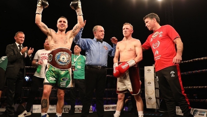 David Oliver Joyce (L) celebrates