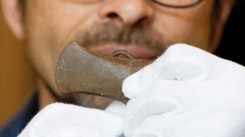 The axe was discovered as a result of illegal metal detecting (Pic: NMI)