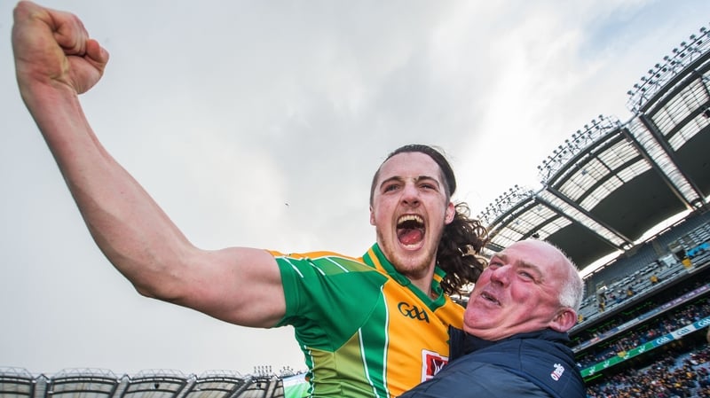 Kieran Molloy celebrates Corofin's latest club triumph with goalkeeping coach Joe Power