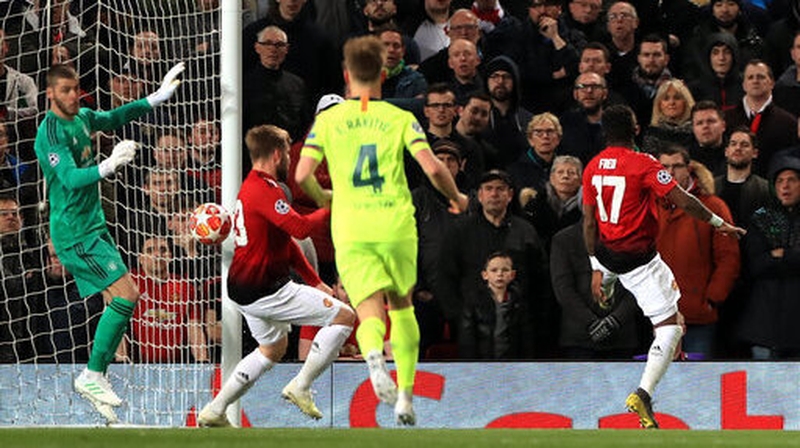 Manchester United's Luke Shaw (second left) scores an own goal