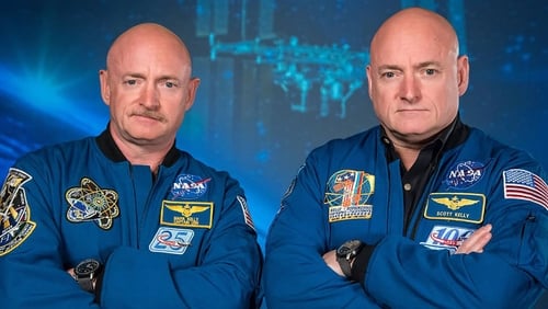 (L-R) Retired astronauts Mark and Scott Kelly