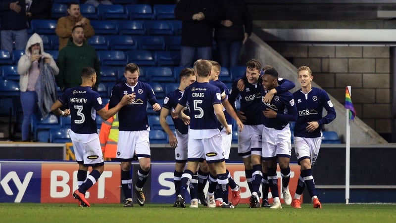 Millwall players celebrate their late equaliser at home to Sheffield United - a goal with big implications for the promotion race