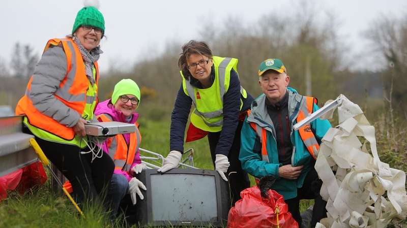 Mary Lyne, Aileen Murphy, Eileen O'Donoghue and Johnny McGuire at the main Tralee road collecting rubbish