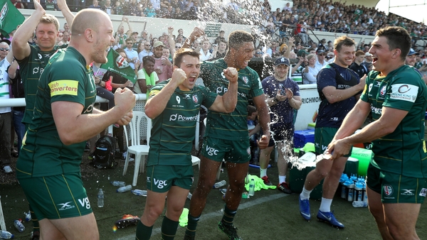 (L-R) Ollie Hoskins, Ben Meehan, Ben Loader and Ian Keatley celebrate promotion