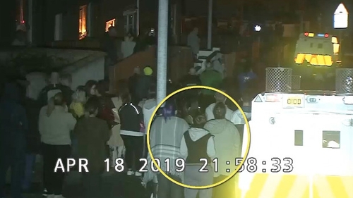 The CCTV footage shows Lyra McKee in the crowd last night