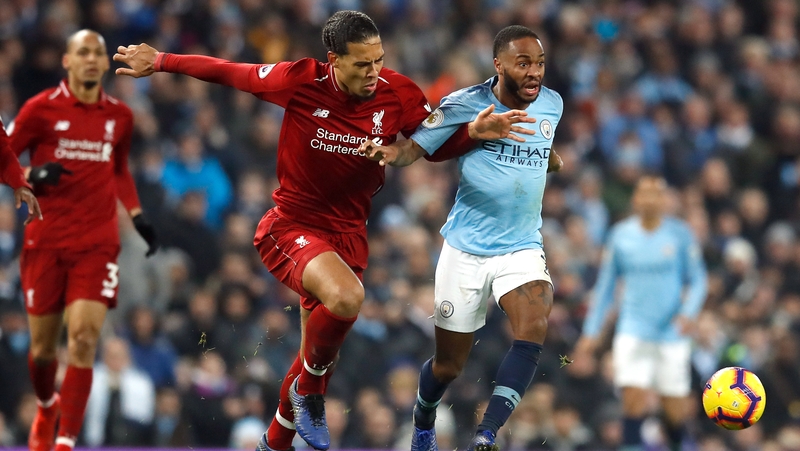 Virgil Van Dijk and Raheem Sterling in action at Anfield