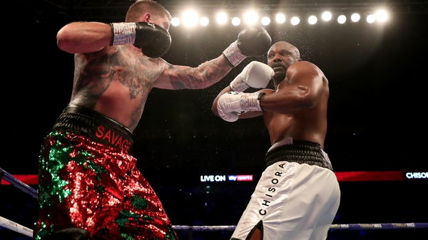 Dillian Whyte (right) is considering a more to MMA