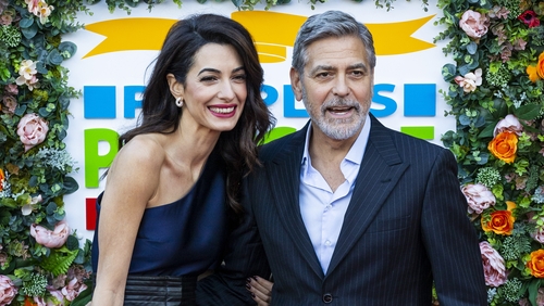 George Clooney pictured with wife Amal