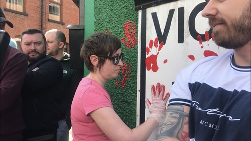 Friends placed handprints on the walls