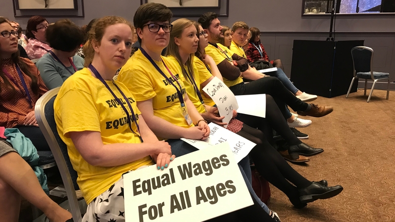 Primary school teachers make their point with placards at the INTO congress in Galway in April 2019
