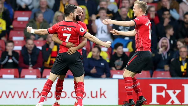 Shane Long (7) celebrates with his team mates after opening the scoring