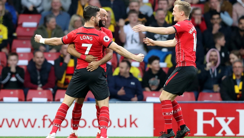 Shane Long (7) celebrates with his team mates after opening the scoring