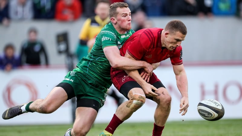 Andrew Conway is tackled over the try line by Connacht's Stephen Fitzgerald
