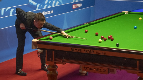 Kyren Wilson edged past Barry Hawkins