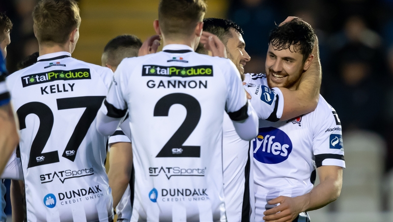 Dundalk Jordan Flores (r) gets the congratulations of his team-mates