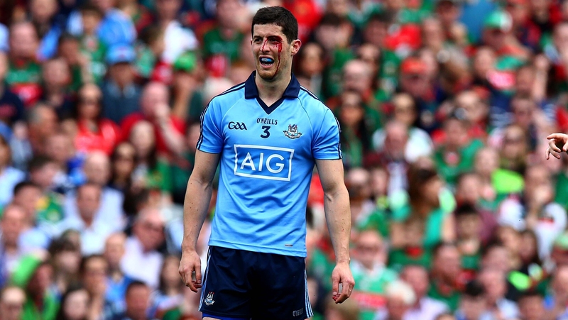 A bloodied O'Carroll in action for Dublin