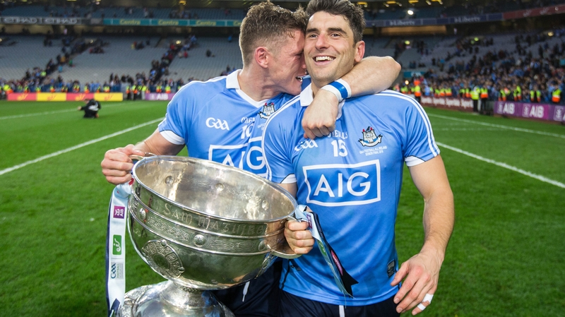 Paul Flynn (L) and Bernard Brogan with Sam Maguire in 2016