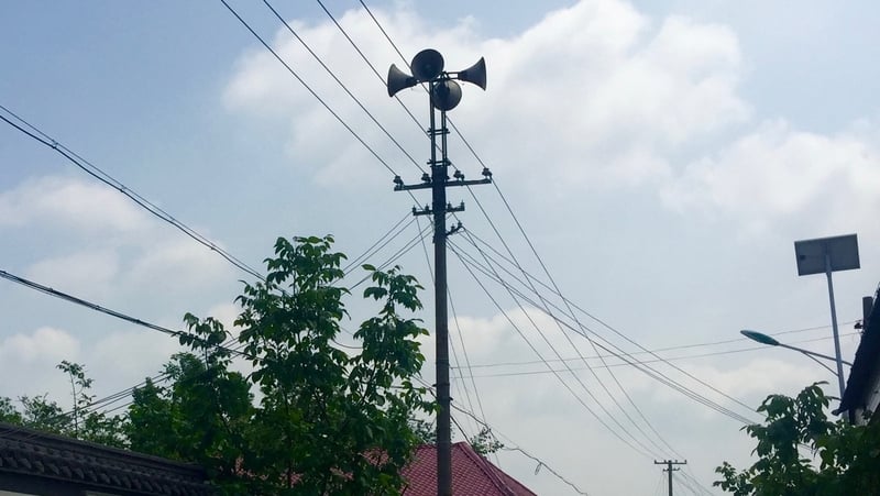 The loudspeakers air their news and propaganda three times a day