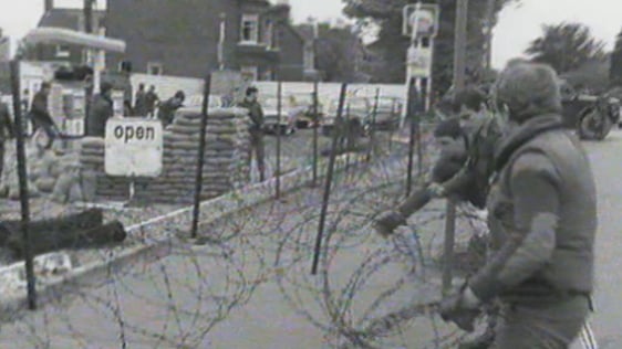 British troops errect barrier at petrol station in Northern Ireland (1974)