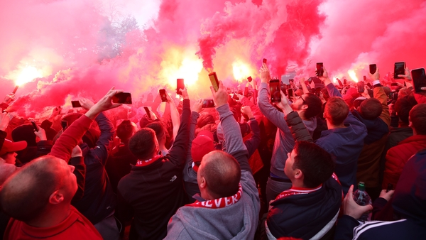 Liverpool have condemned a flag that was hung in the away end at Genk
