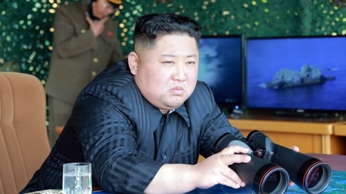 Kim Jong Un supervising an earlier 'strike drill' - reportedly testing long-range multiple rocket launchers and tactical guided weapons into the East Sea during a military drill on 4 May, 2019