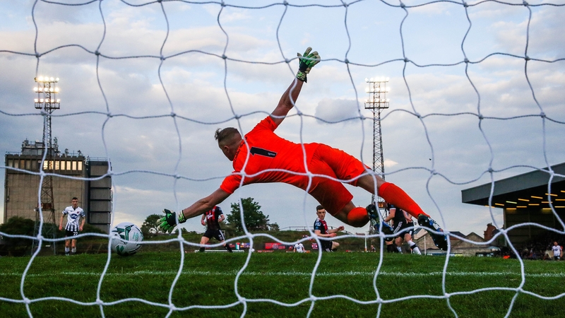 Bohs' James Talbot is beaten by a shot from Georgie Kelly of Dundalk to concede a goal Mandatory Credit ©INPHO/Ryan Byrne